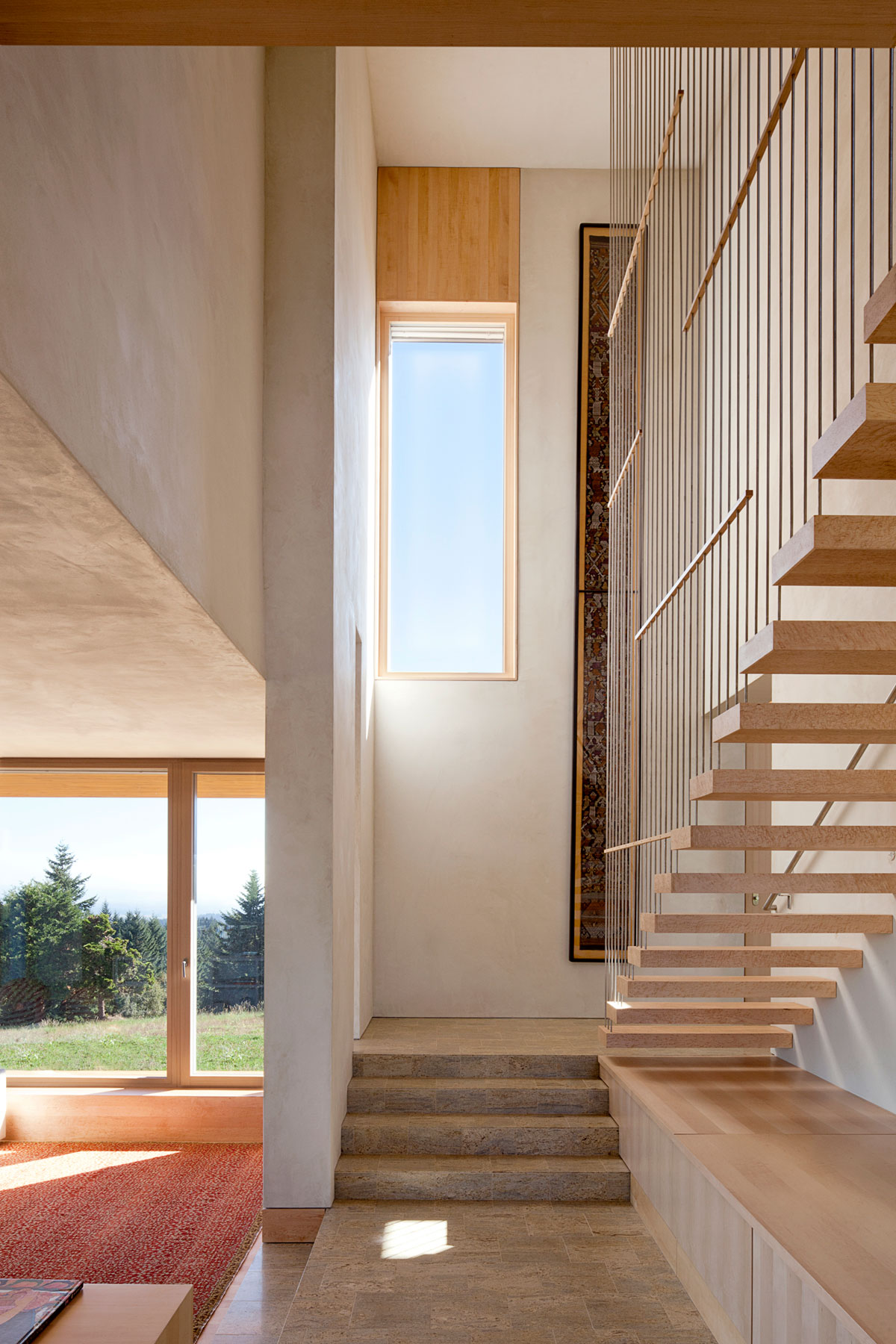 Stairwell of new home, Karuna House, designed by Holst Architecture and built by home builder Hammer & Hand