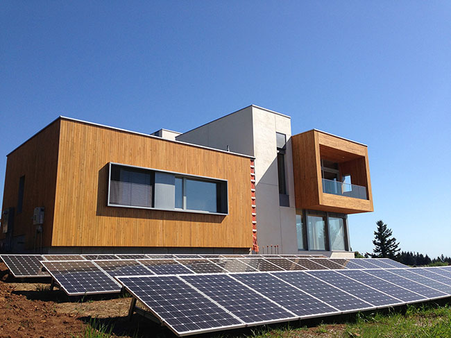 Karuna House and photovoltaic array.