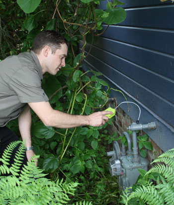 building scientist performing home energy audit services