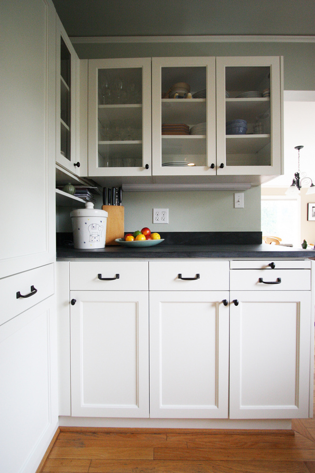 refaced cabinets with antique hardware
