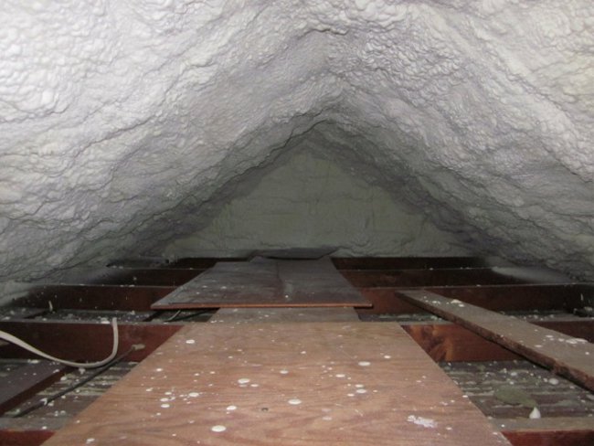 spray foam used to insulate and air seal an attic