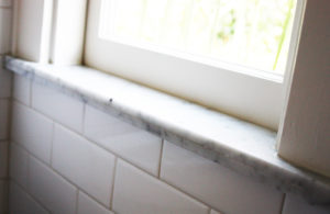 Windowsill in Tiny Bath Remodel by Home Builder Hammer & Hand