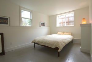 Bedroom in Twin Studios Duplex Conversion