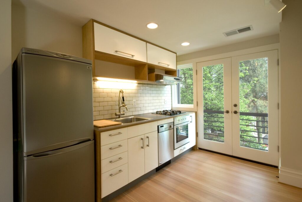 Kitchenette and Balcony in Twin Studios Duplex Conversion