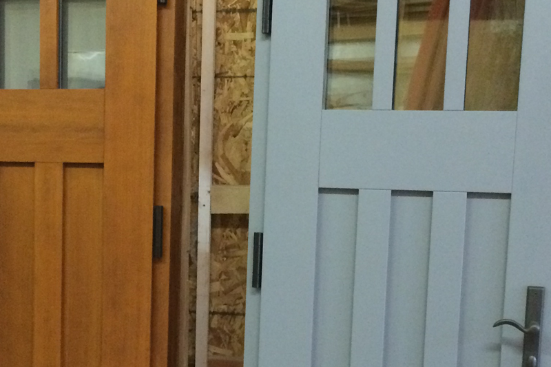 Two Passive House Doors by Hammer and Hand
