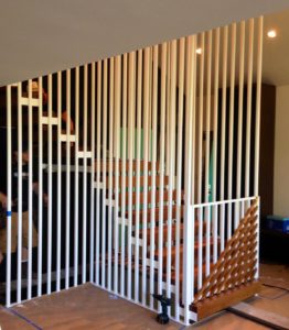 Custom staircase and baby gate for mid-century modern home in Portland