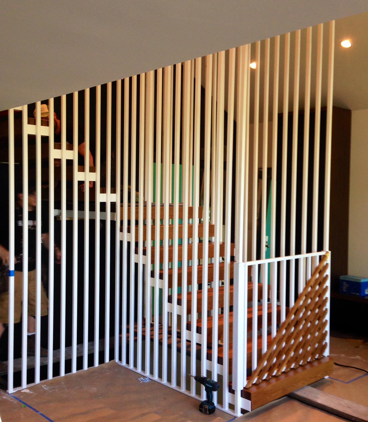 Custom staircase and baby gate for mid-century modern home in Portland