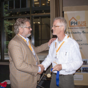 Sam Hagerman Accepts Award from PHIUS