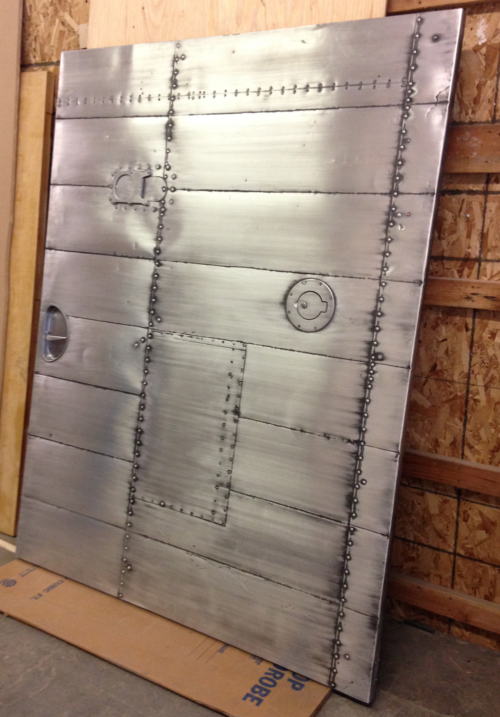 Custom Door Inspired by WWII Bomber Planes & Vintage Cars | Hammer & Hand