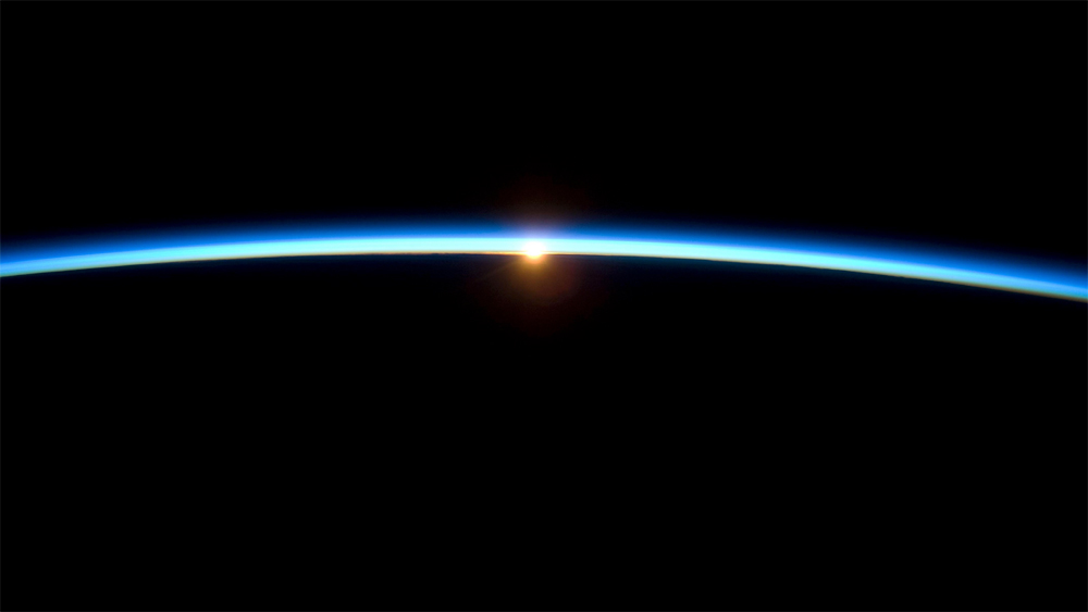 Sun shining through atmosphere - from International Space Station